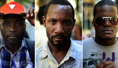 Imagen de tres inmigrantes haitianos