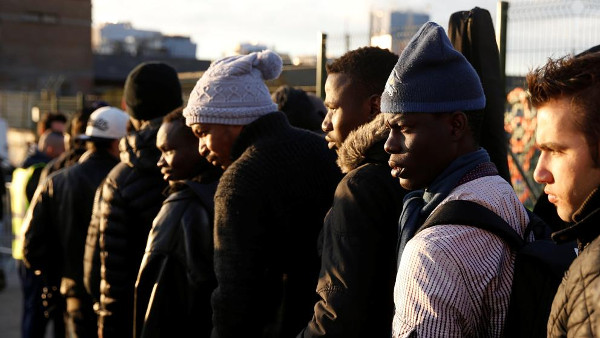 Grupo de migrantes en París